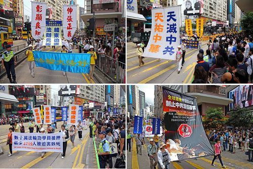 图3.壮观的游行队伍震撼港民与游客围观，不少人拿起相机、手机拍照。